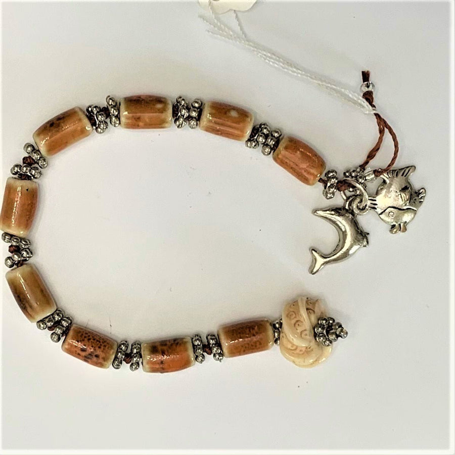 Chinese Knotted Bracelet with Pewter Charms - The Irritable Pelican Artisan Gallery